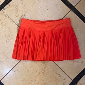 Bright red/orange Lululemon tennis skirt in size 6 pleated